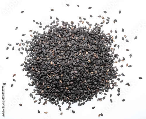 Heap of black cumin seeds isolated on white background. Top view.