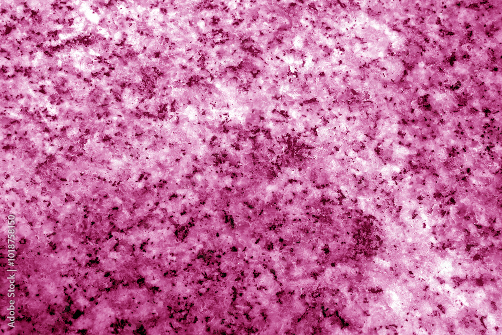 Granite surface as background with blur effect in pink tone. Granite surface as background with blur effect in pink tone.