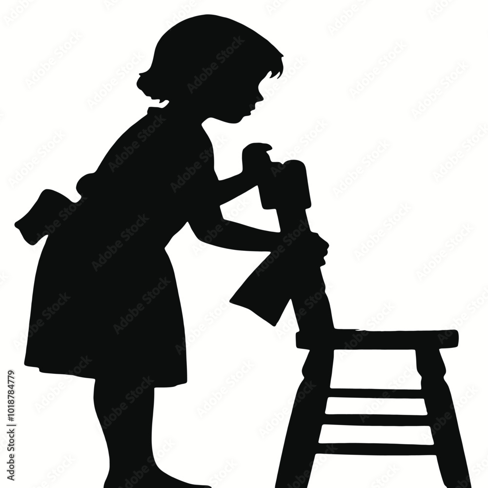 A young girl with short hair clinging on a chair, silhouetted against a plain background A young girl with short hair clinging on a chair, silhouetted against a plain background