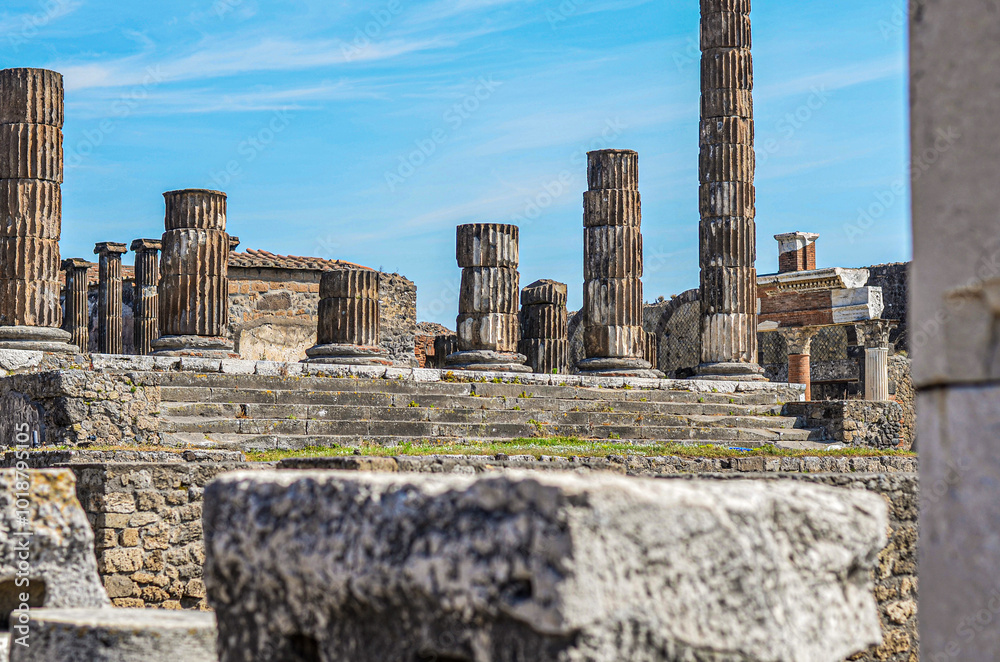 Ruins of ancient city of Pompeii, Naples. Ruined columns.