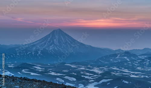 Sunrise from the top of the Gorely volcano and view to the Vilyuchinsky volcano in the Kamchatka Peninsula in Russia. photo