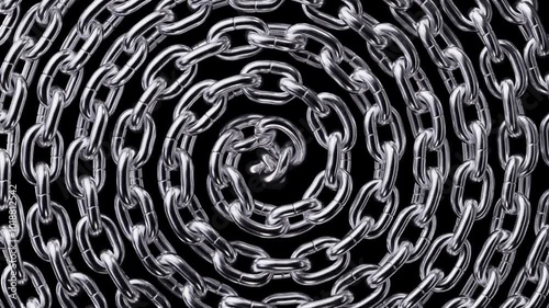 looped 3d animation of spiraling silver chain macro isolated on black background photo