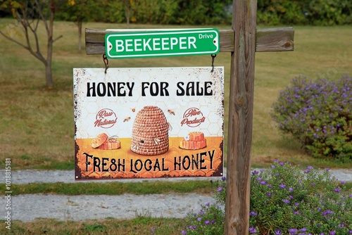 Rustic sign showing honey for sale