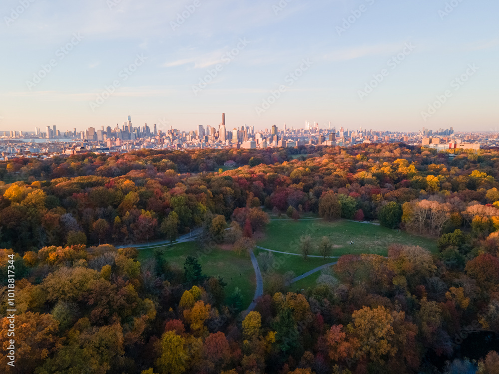Aerial landscape of Prospect Park lake and Brooklyn Manhattan Skylines during fall in New York City Aerial landscape of Prospect Park lake and Brooklyn Manhattan Skylines during fall in New York City