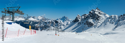 Obraz na płótnie Ski lift and ski runs in Arabba ski resort in Dolomites, Italy w salonie
