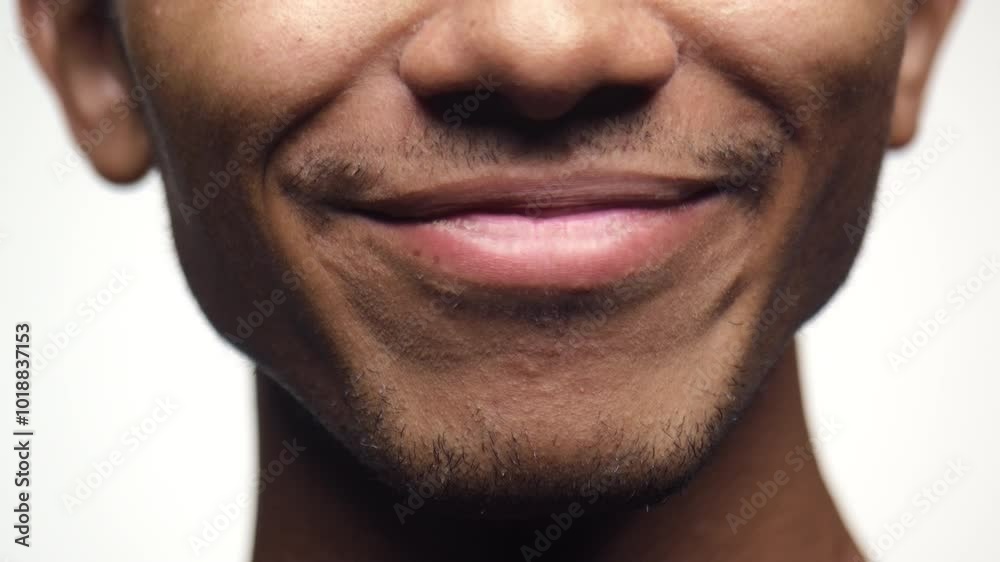 Close-up of Man Smiling Mouth Isolated on White Background Close-up of Man Smiling Mouth Isolated on White Background
