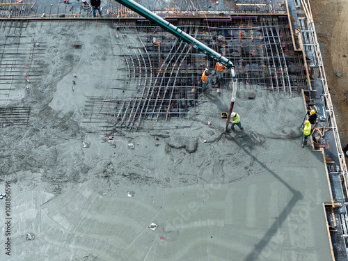 Pouring a concrete slab with an industrial pump