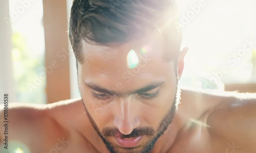 Tunisian Man Stretching in Bright Yoga Studio