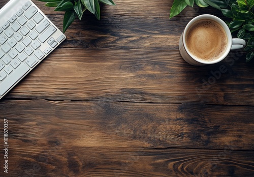 Cozy workspace with coffee cup, keyboard, and potted plant on rustic wooden t...