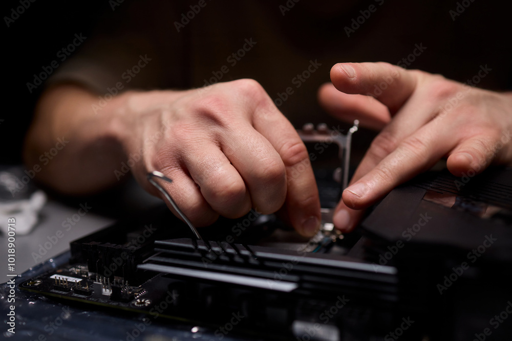 Hands Engaged in the Process of Working on Computer Hardware Installation and Upgrading Hands Engaged in the Process of Working on Computer Hardware Installation and Upgrading