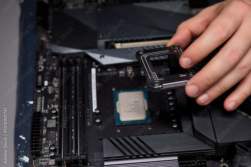 Hands Engaged in the Process of Working on Computer Hardware Installation and Upgrading Hands Engaged in the Process of Working on Computer Hardware Installation and Upgrading