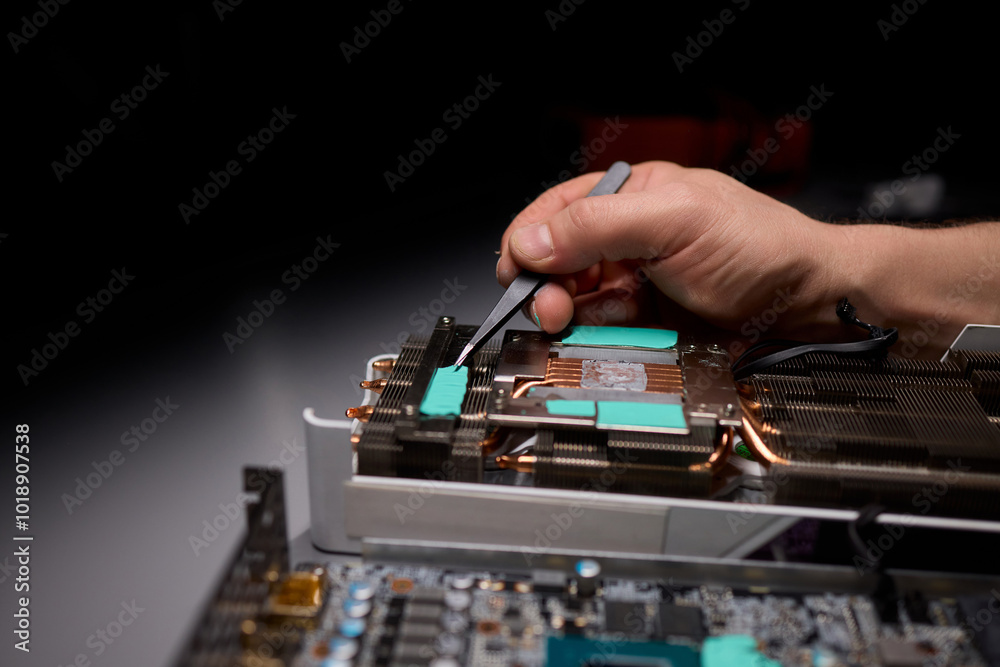 Hand Repairing a Graphics Card through the Application of Thermal Paste for Better Performance Hand Repairing a Graphics Card through the Application of Thermal Paste for Better Performance