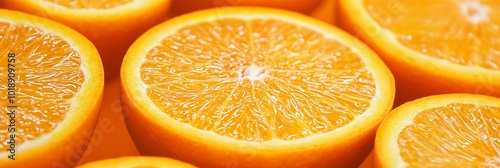 Several orange halves displayed, showcasing their detailed, juicy texture and vibrant, fresh appearance against a bright background. photo