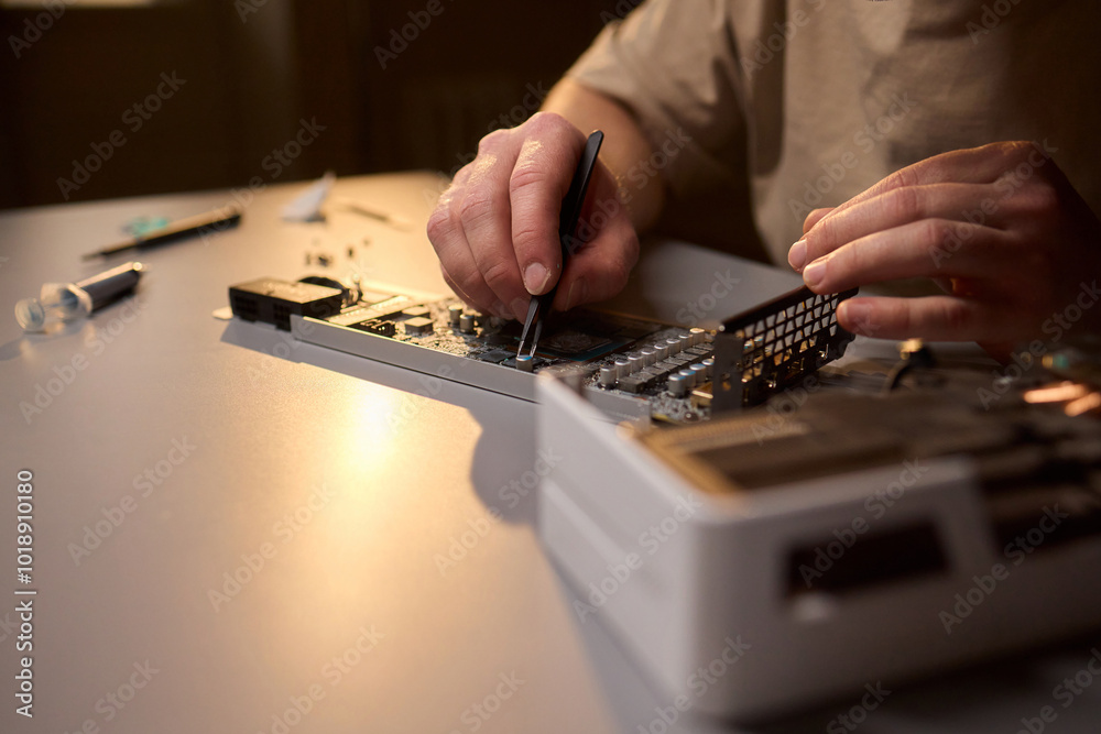 Fototapeta premium Assembling a graphics card equipped with an advanced and highly efficient cooling system