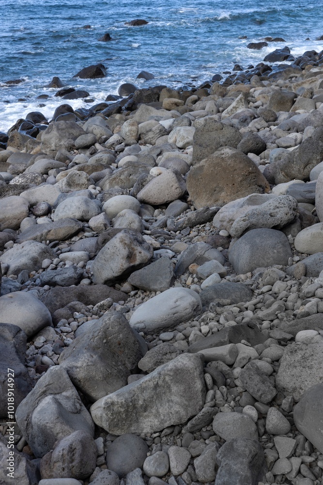 Rocks at the beach. Coast at Praia de São Jorge. Ocean.
