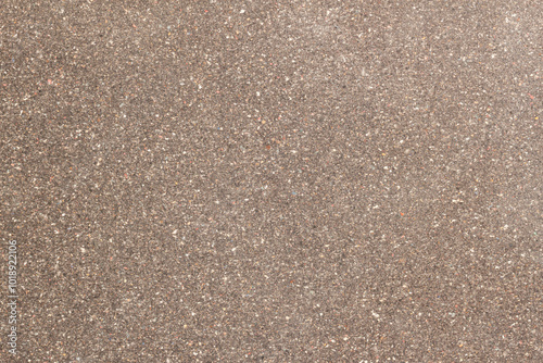 Smooth, natural stone surface, blend of earthy brown tones with subtle patterns