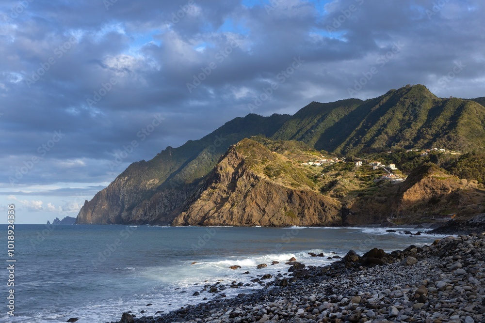 Ocean coast and beach and moutains at sunset. Porto da Cruz Madeira. Ocean coast and beach and moutains at sunset. Porto da Cruz Madeira.