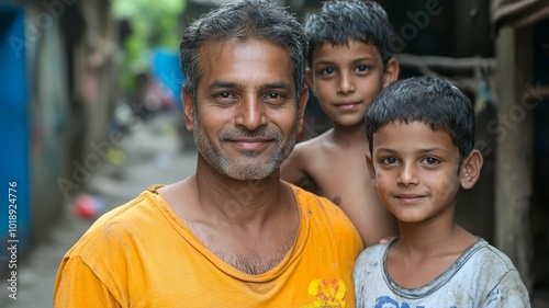 Joyful interaction between a man and two boys in a vibrant neighborhood during a sunny afternoon