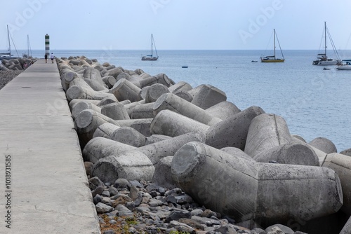 View on the harbor of Funchal. Madeira . Protection from the sea with blocks of concrete. photo