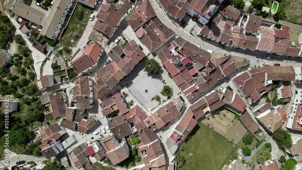 Aerial view of a Mediterranean village with central plaza, historic houses, and narrow streets, Atajate, Malaga, Andalucia, Spain Aerial view of a Mediterranean village with central plaza, historic houses, and narrow streets, Atajate, Malaga, Andalucia, Spain