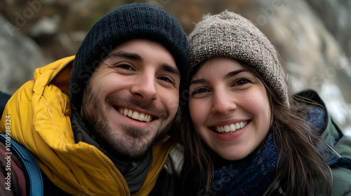 Cheerful couple enjoying outdoor adventure, close-up smiling portrait.