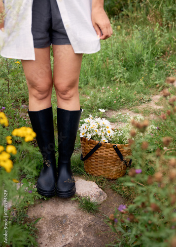 woman posing with straw basket  photo