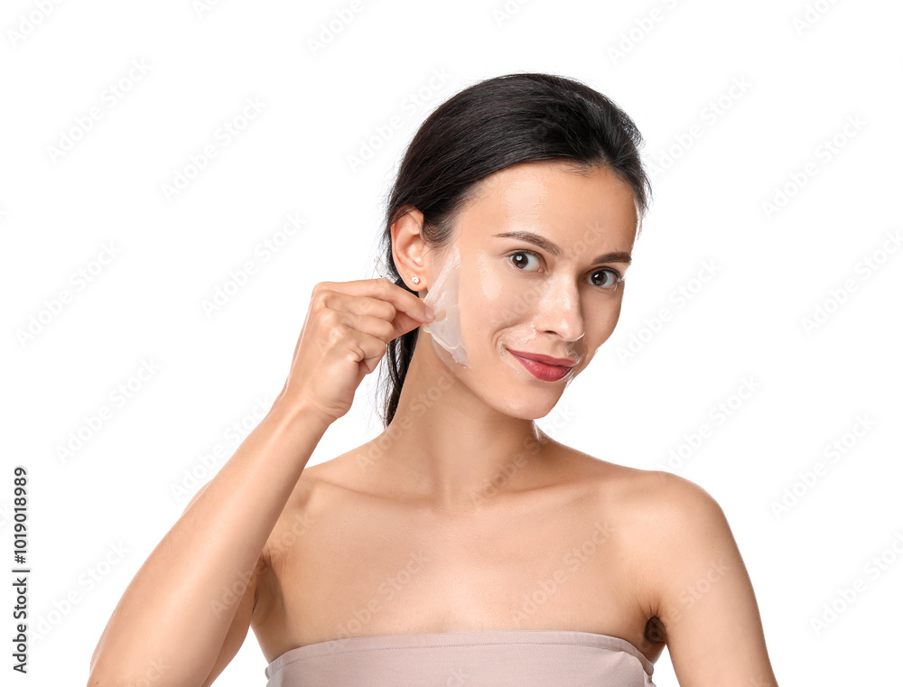 Beautiful woman peeling off face mask on white background Beautiful woman peeling off face mask on white background