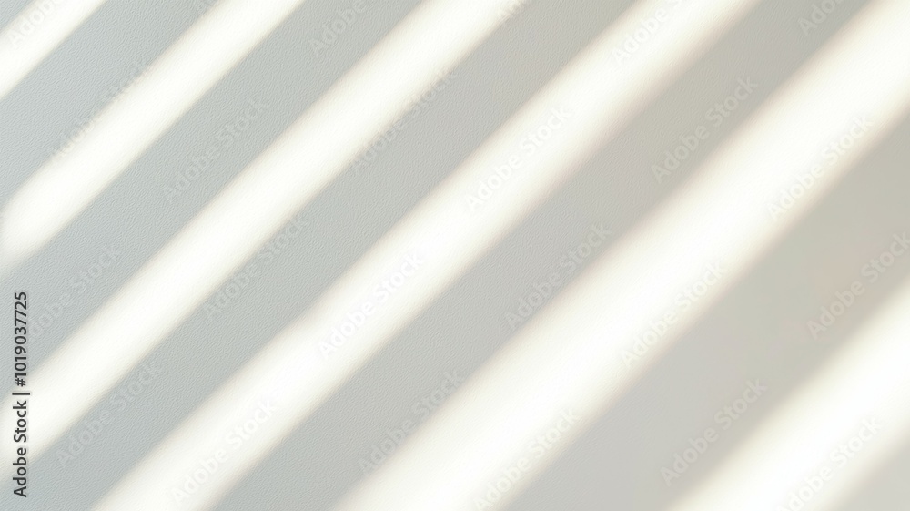 Obraz premium A white wall with a pattern of light and dark stripes