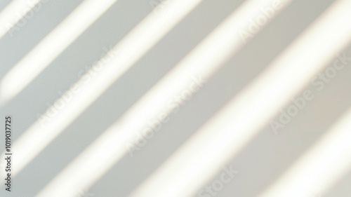 A white wall with a pattern of light and dark stripes