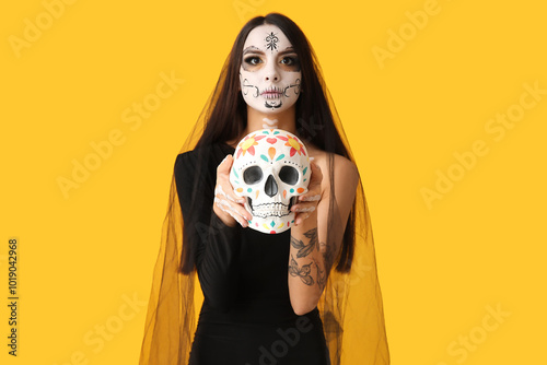 Young woman dressed as dead...