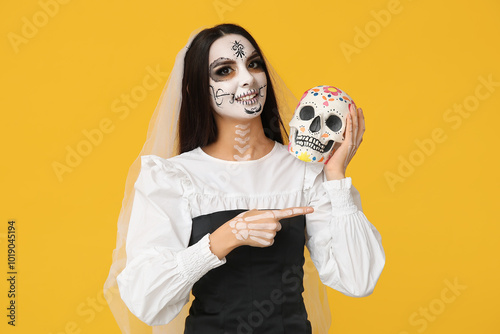 Young woman dressed as dead...
