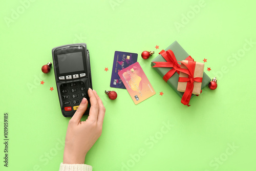 Female hand with payment te...
