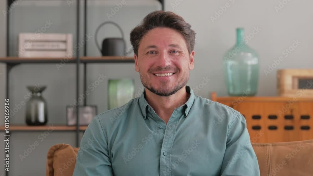Portrait of Confident Young Man Smiling at Home