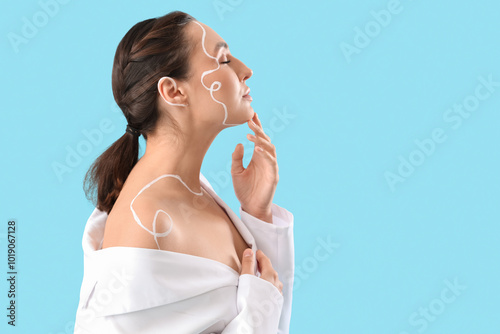 Young woman with painted fa...