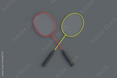 Set of badminton rackets on gray background. Game for hobby and leisure. Sports equipment. Top view. 3d render