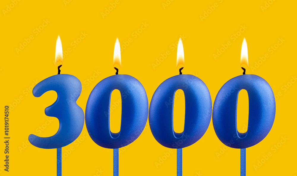 Blue birthday candle on yellow background - Number 3000 Blue birthday candle on yellow background - Number 3000