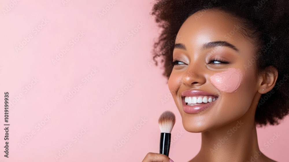 A cheerful woman with a bright smile applies a light pink tint to her cheeks with a cosmetic brush, capturing joy and a sense of lively confidence. A cheerful woman with a bright smile applies a light pink tint to her cheeks with a cosmetic brush, capturing joy and a sense of lively confidence.