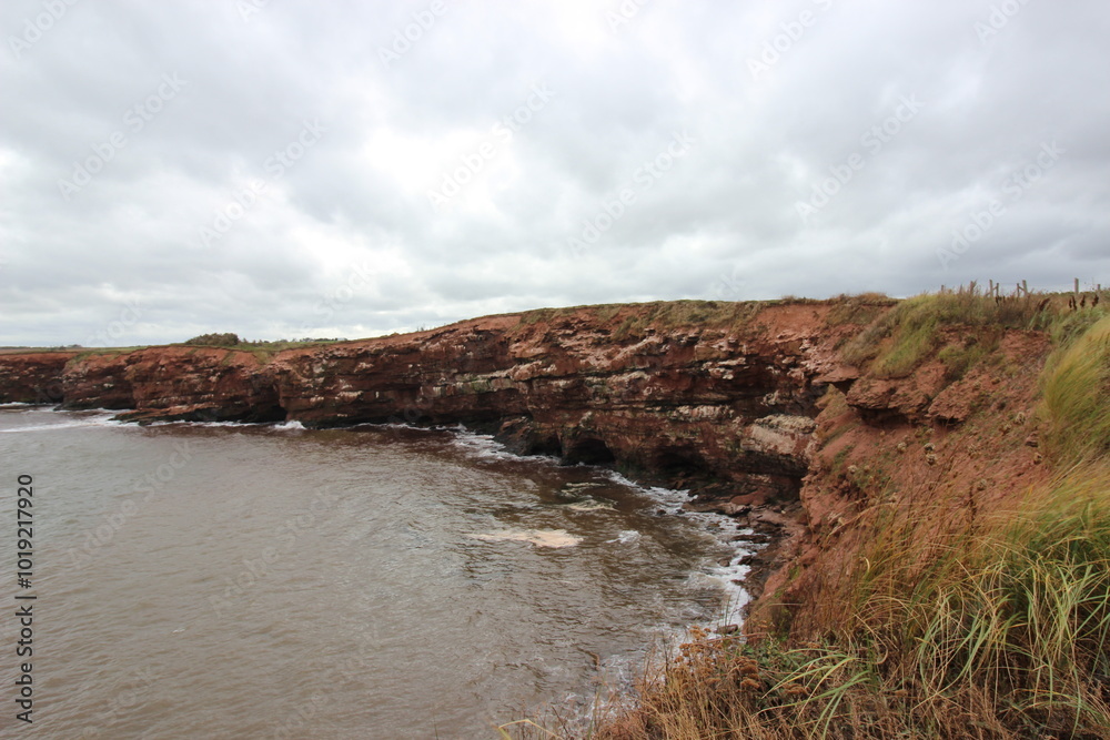 Cliff on the rugged coastline of Prince Edouard Island on the Atlantic Ocean