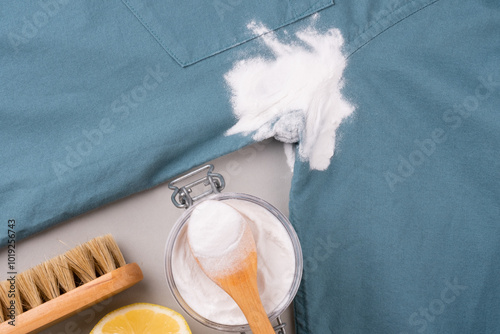 Natural cleaning method to remove sweat stains under the armpits. Eco-friendly remove stains from clothes using baking soda. Embracing a zero-waste lifestyle. top view. photo