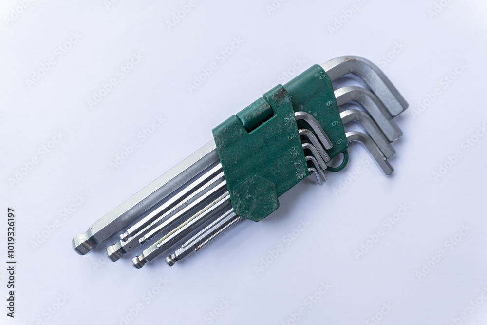 A set of hex keys, also known as Allen wrenches, in a convenient green plastic holder. A set of hex keys, also known as Allen wrenches, in a convenient green plastic holder.