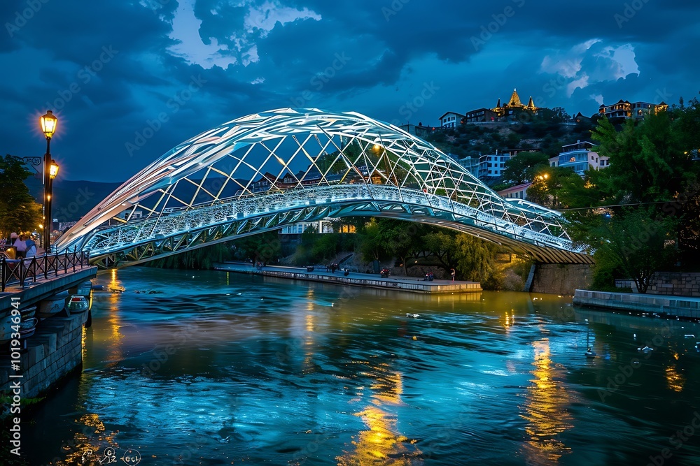 Naklejka premium Bridge over the river at night in Tbilisi, Georgia.