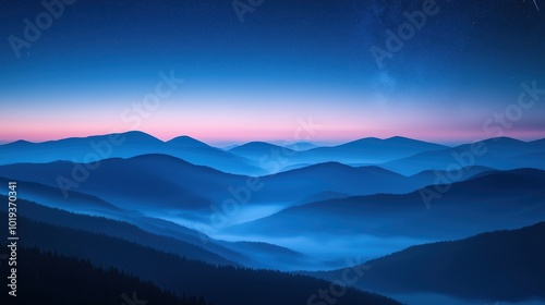 View of beautiful night sky with stars in foggy mountain valley. Scenic landscape of misty hills under blue starry sky. Concept of astrology and magical night time.