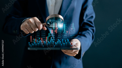 Businesswomen use magnifier glass find stock in stock markets, uptrends, growth economics, business strategy development, and opportunities for investment, take profit from funds, Financial Analyst.