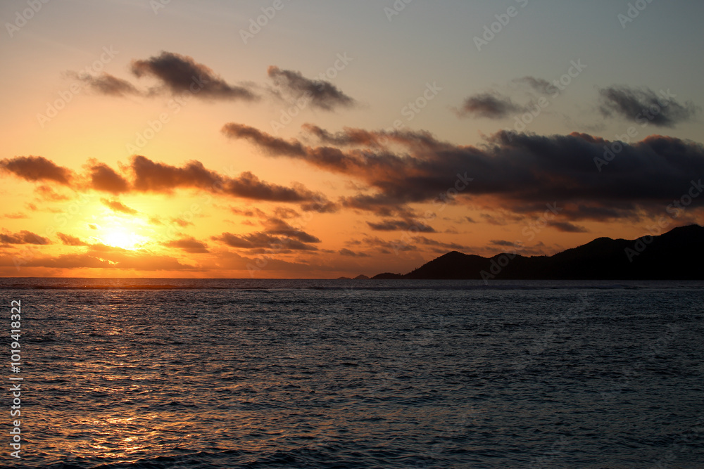 Sunset and evening glow on the beach, Seychelles Sunset and evening glow on the beach, Seychelles