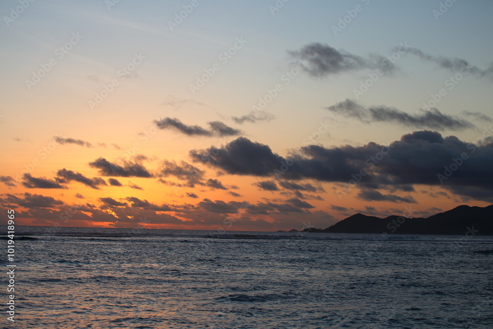 Sunset and evening glow on the beach, Seychelles Sunset and evening glow on the beach, Seychelles