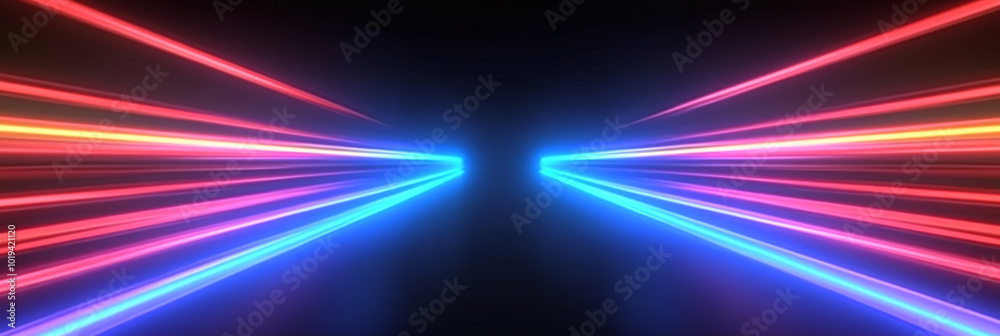 Obraz premium Abstract light streaks in blue and red on a black background.