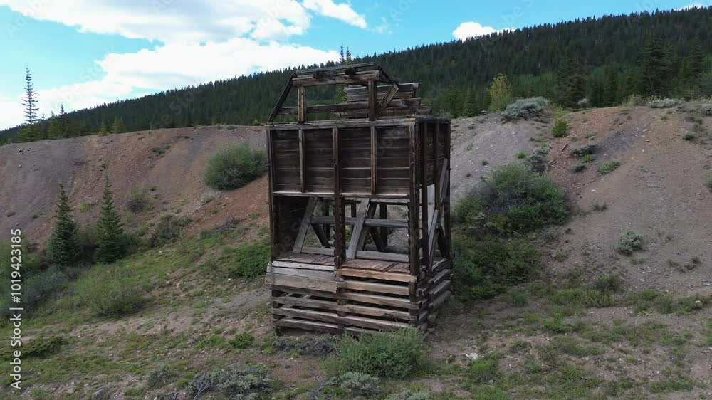 Timber Rises Mining Mining ruins near Leadville Colorado. Rotating pan shot of the remains ...