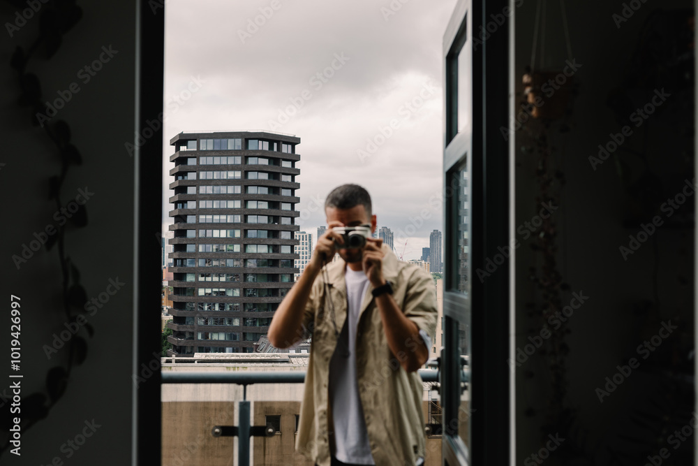 Vacationer uses compact camera to shoot pics of his holiday apartment Vacationer uses compact camera to shoot pics of his holiday apartment
