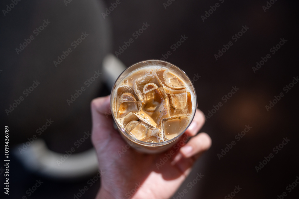 glass of coffee with milk on the table glass of coffee with milk on the table