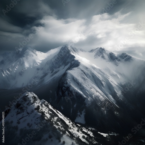 Beautiful winter mountains landscape with snow covered peaks and blue sky.